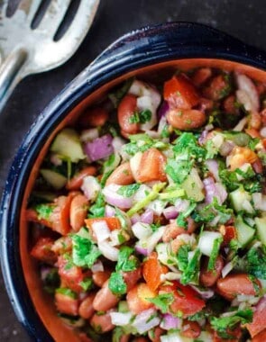 Kidney Bean Salad with Cilantro and Dijon Vinaigrette | The Mediterranean Dish. BuzzFeed calls this salad, “incredible!” A simple and tasty salad of kidney beans, chopped cucumbers, tomatoes and red onions with cilantro, sumac and a zesty Dijon vinaigrette. It will be your new favorite!