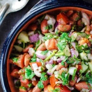 Kidney Bean Salad with Cilantro and Dijon Vinaigrette | The Mediterranean Dish. BuzzFeed calls this salad, “incredible!” A simple and tasty salad of kidney beans, chopped cucumbers, tomatoes and red onions with cilantro, sumac and a zesty Dijon vinaigrette. It will be your new favorite!