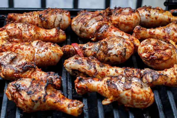 Chicken Drumsticks being cooked on the grill