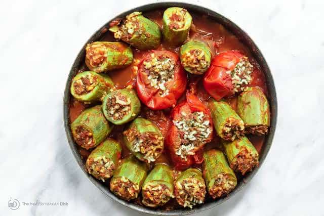 Stuffed Zucchini with tomato sauce added to skillet