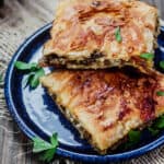 Phyllo Meat Pie Recipe (Egyptian Goullash) | The Mediterranean Dish. Spiced ground beef nestled in between layers of crispy, flaky, buttery phyllo dough! Recipe comes with step-by-step photos. An easy dinner with a big wow factor!