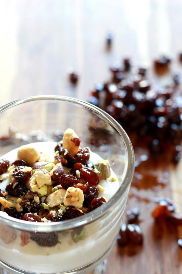 Assembled parfait with raisins and ground nuts on top