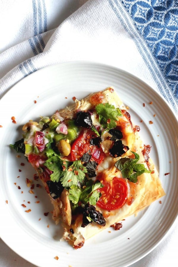 Slice of Phyllo Pizza with vegetables and chicken