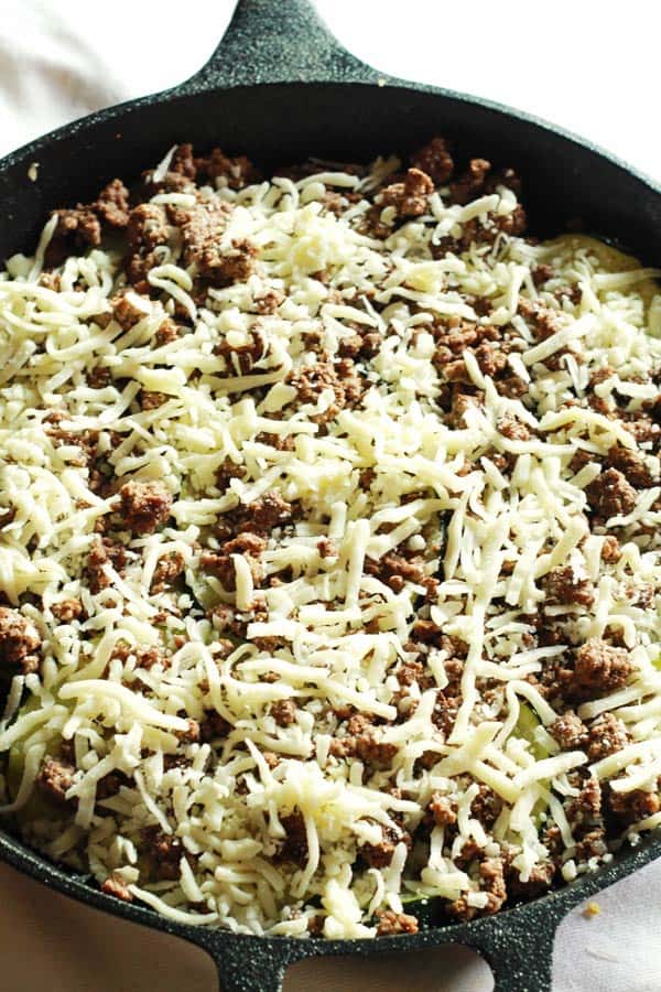 Grated cheese added to top of casserole