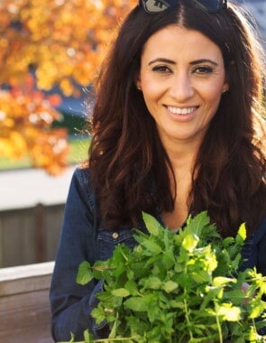 Suzy Karadsheh from The Mediterranean Dish with freshly picked spearmint