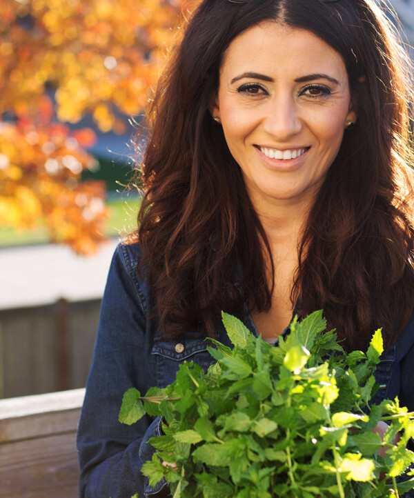Suzy Karadsheh from The Mediterranean Dish with freshly picked spearmint