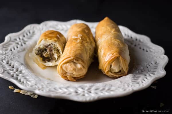 Meat rolls, one cut in half to show filling