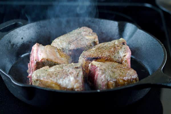 Spiced Lamb Chops frying in pan