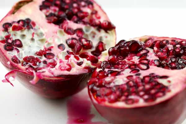 Sliced Pomegranates to garnish chicken thighs