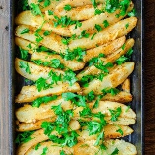 Best Greek Potatoes | The Mediterranean Dish. Greek-style lemon roasted potatoes with garlic and a sprinkle of parmesan cheese. The best roasted potatoes out there from themediterraneandish.com
