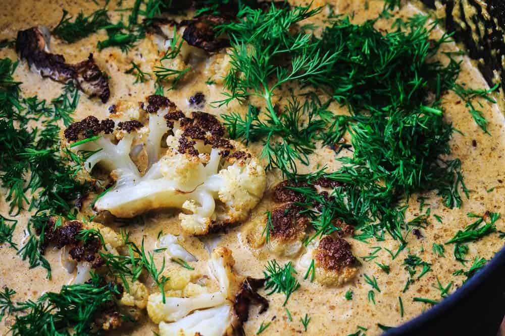 One Pot Cauliflower Soup with Roasted Cauliflower and Fresh Dill added