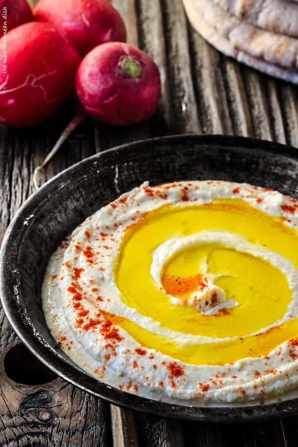 a recipe for how to make hummus in a creamy, traditional way | The Mediterranean Dish