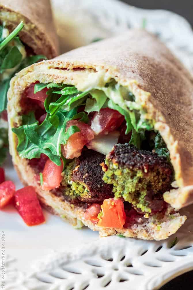 Falafel wraps with fresh vegetables and tahini sauce