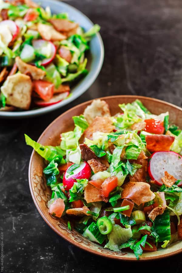 Two servings of Fattoush Salad in bowls