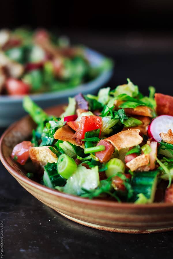 Mediterranean Fattoush Salad topped pita bread