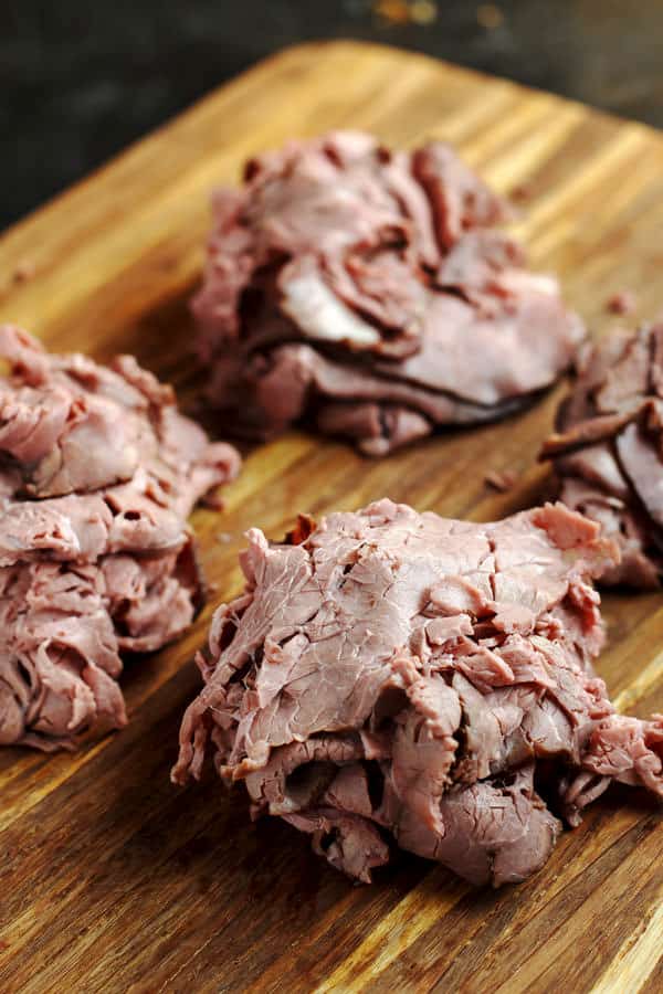 Separate roast beef into four servings