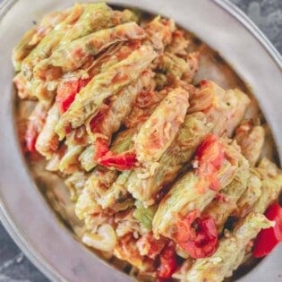 Stuffed cabbage rolls with tomatoes on a plate