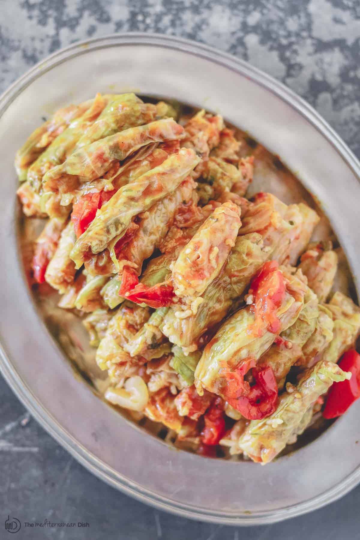 Stuffed cabbage rolls with tomatoes on a plate