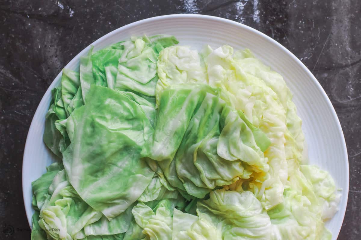 Separated cabbage leaves prepped for stuffed cabbage rolls