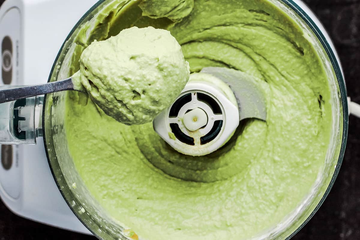 Avocado hummus mixed to a creamy texture in food processor