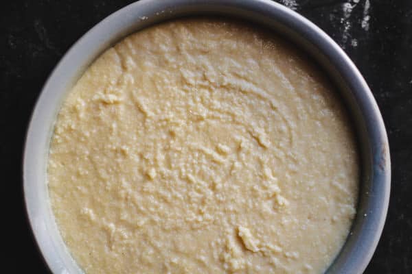 Semolina mixture transferred to a greased pan