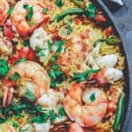 Seafood paella in a cast iron pan