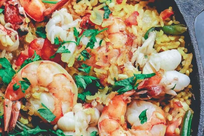Seafood paella in a cast iron pan
