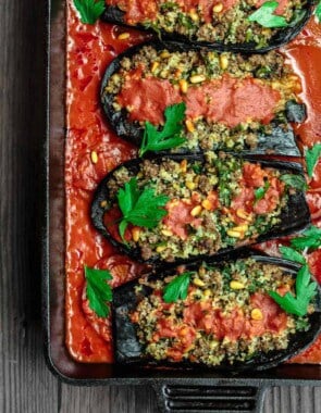 Mediterranean Stuffed Eggplant Recipe | The Mediterranean Dish. This is a must-try all star recipe for stuffed eggplants. Roasted eggplants stuffed with a fragrant spiced meat, bulgur and pine nut mixture. So good! See full recipe on TheMediterraneanDish.com