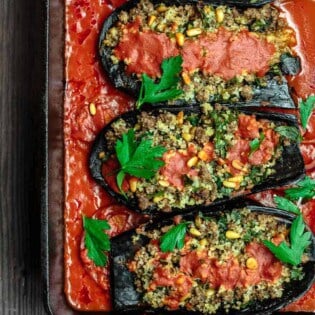 Mediterranean Stuffed Eggplant Recipe | The Mediterranean Dish. This is a must-try all star recipe for stuffed eggplants. Roasted eggplants stuffed with a fragrant spiced meat, bulgur and pine nut mixture. So good! See full recipe on TheMediterraneanDish.com