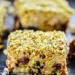 Easy No Bake Dessert Bars w/ Dates, honey and nuts! Dates stuffed with walnuts and topped with a honeyed buttery cookie and pistachios! Best part, ready in 20 minutes | The Mediterranean Dish