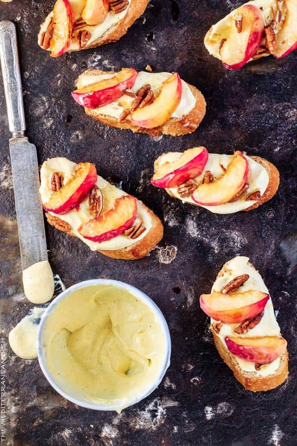 Peaches and Orange Whipped Greek yogurt crostini with extra yogurt served on the side