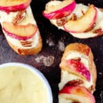 Roasted Peaches and Orange Whipped Greek yogurt crostini | The Mediterranean Dish. An easy recipe that will satisfy the sweet tooth in all of us. Serve these crostini for brunch or dessert!
