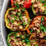Stuffed Bell Pepper Recipe with Rice, Spiced Ground Beef and Chickpeas. Stuffed peppers, Mediterranean style from The Mediterranean Dish. A simple recipe with step-by-step photos!