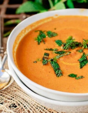 Roasted Carrot Soup with Ginger, Mediterranean spices, and fresh mint garnish.