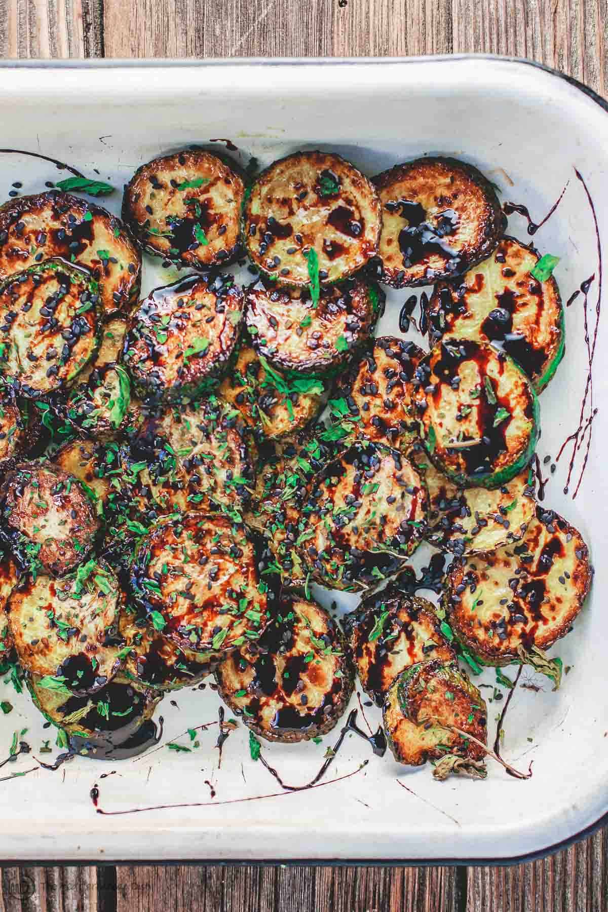 Zucchini with balsamic glaze and black sesame seeds