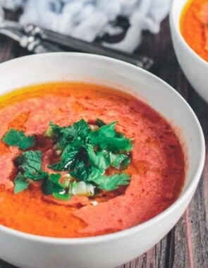 Tomato Gazpacho Soup, topped with fresh herbs