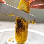 Chorizo Tomato and Charred Corn Salad | The Mediterranean Dish. Serve it as a salad, side dish or even its own meal! This exciting Mediterranean salad will be your new favorite!