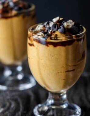 5-Minute Pumpkin Greek Yogurt Parfait | The Mediterranean Dish. Pumpkin puree, Greek yogurt, a little mascarpone with brown sugar, molasses! Top with chocolate chips and your favorite nuts! The perfect gluten-free Thanksgiving treat...but if you ask me, I'll have this for breakfast any day!