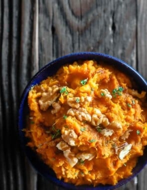 Roasted Mashed Sweet Potatoes with Thyme and Molasses | The Mediterranean Dish. Do not hide your mashed sweet potatoes underneath marshmallows. Try this simple, rustic and flavor packed mashed sweet potatoes instead. The perfect Thanksgiving dish.