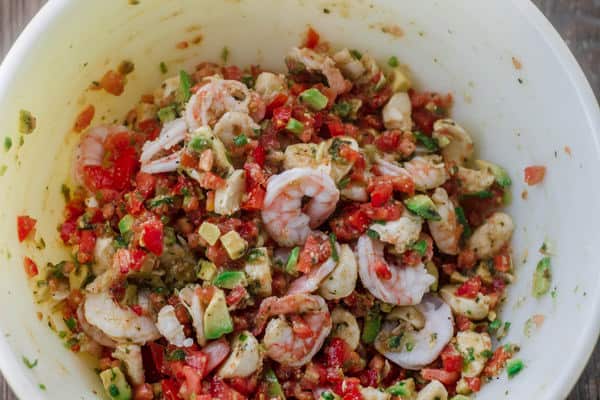 Shrimp Bruschetta Ingredients combined together in a bowl