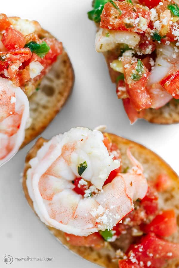 Assembled Shrimp Bruschetta on crispy toast