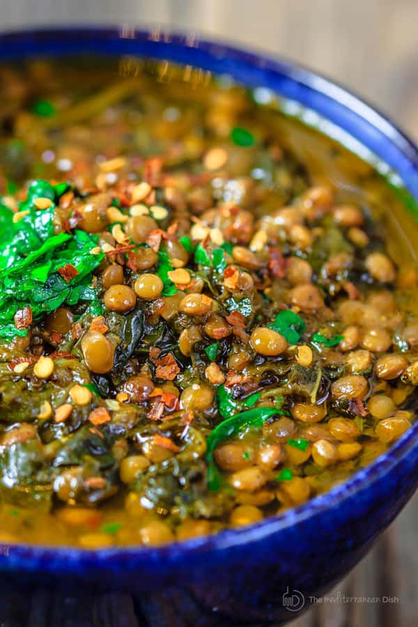 Mediterranean Spicy Spinach Lentil Soup Recipe| The Mediterranean Dish. A nutritious, flavor-packed lentil soup that comes together in minutes. Following the Mediterranean diet is easy with meals like this lentil soup!