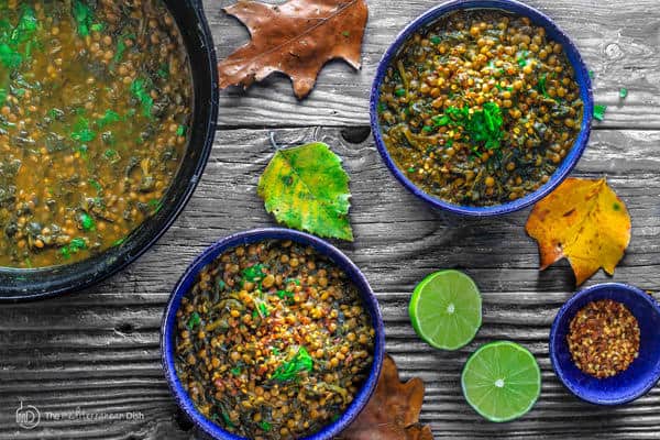 Mediterranean Spicy Spinach Lentil Soup Recipe | The Mediterranean Dish. A nutritious, flavor-packed lentil soup that comes together in minutes. Following the Mediterranean diet is easy with meals like this lentil soup!