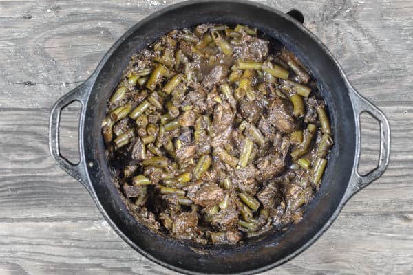 Beef stew with vegetables and spices in pot after cooking on stove top