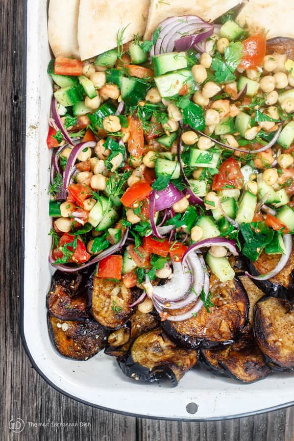 Mediterranean Za’atar Chickpea Salad Recipe with Fried Eggplant | The Mediterranean Dish. A flavor-packed Mediterranean peasant salad with chickpeas, chopped vegetables, eggplant and Za’atar. A meal in its own right! Get the step-by-step tutorial.