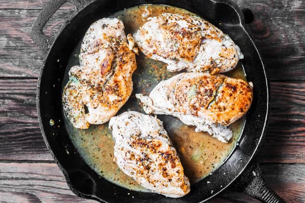 Browned chicken in skillet