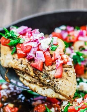 One-Skillet Mediterranean Chicken Recipe | The Mediterranean Dish. This Greek-inspired chicken dinner comes together in 15 minutes! Four chicken breasts and a few flavor-packed ingredients is all you need!