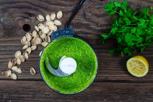 Ingredients for Pistachio Cilantro Pesto combined in a food processor