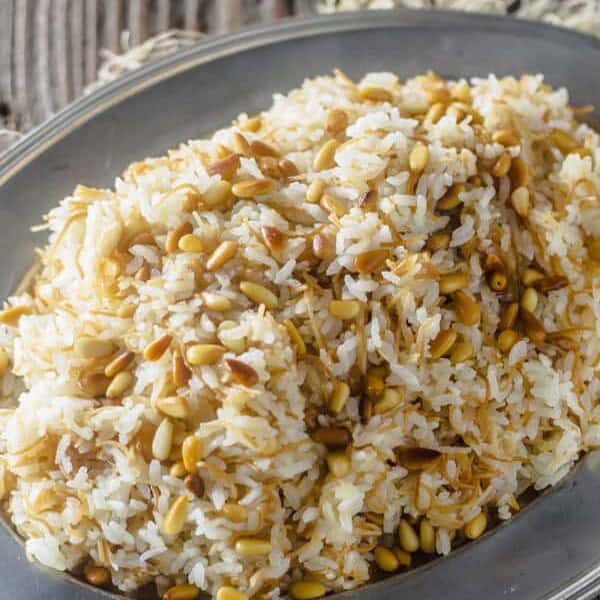 Lebanese Rice Recipe | The Mediterranean Dish. The perfect rice pilaf with olive oil, vermicelli pasta and toasted pine nuts. Recipe with step-by-step photos at The Mediterranean Dish!