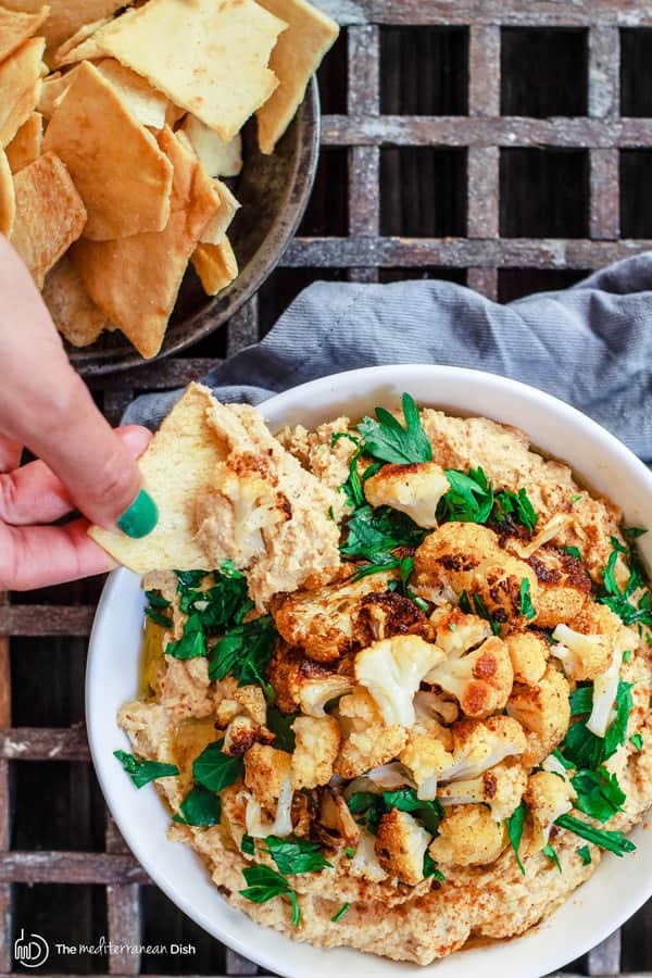 Cauliflower tahini dip served with pita chips